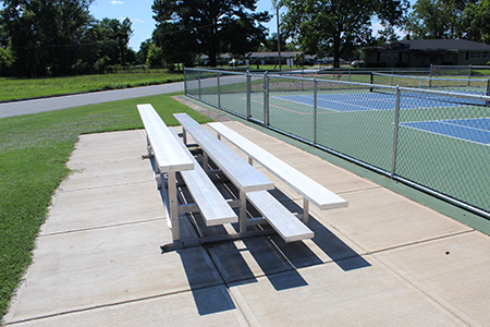 Spectator bleachers outside the tennis court